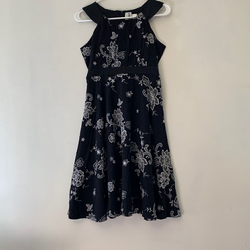 Rare Editions black dress with white embroidered flowers. Tie back. Size 14